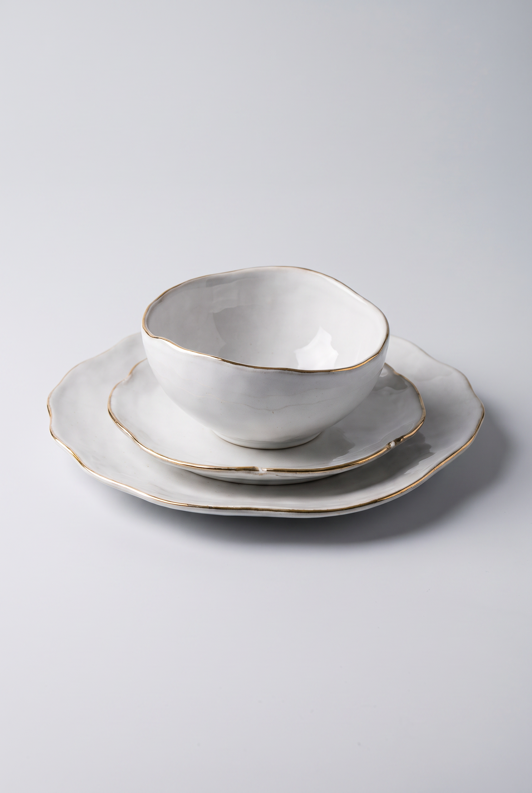 Ceramica White and Gold Dinnerware Set – front product view