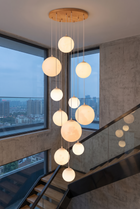 OpalineGlow Glass Globe Chandelier – in-use room view