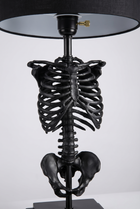 NecroLuxe Gothic Skeleton Table Lamp - close-up of sculpted resin skeleton detail