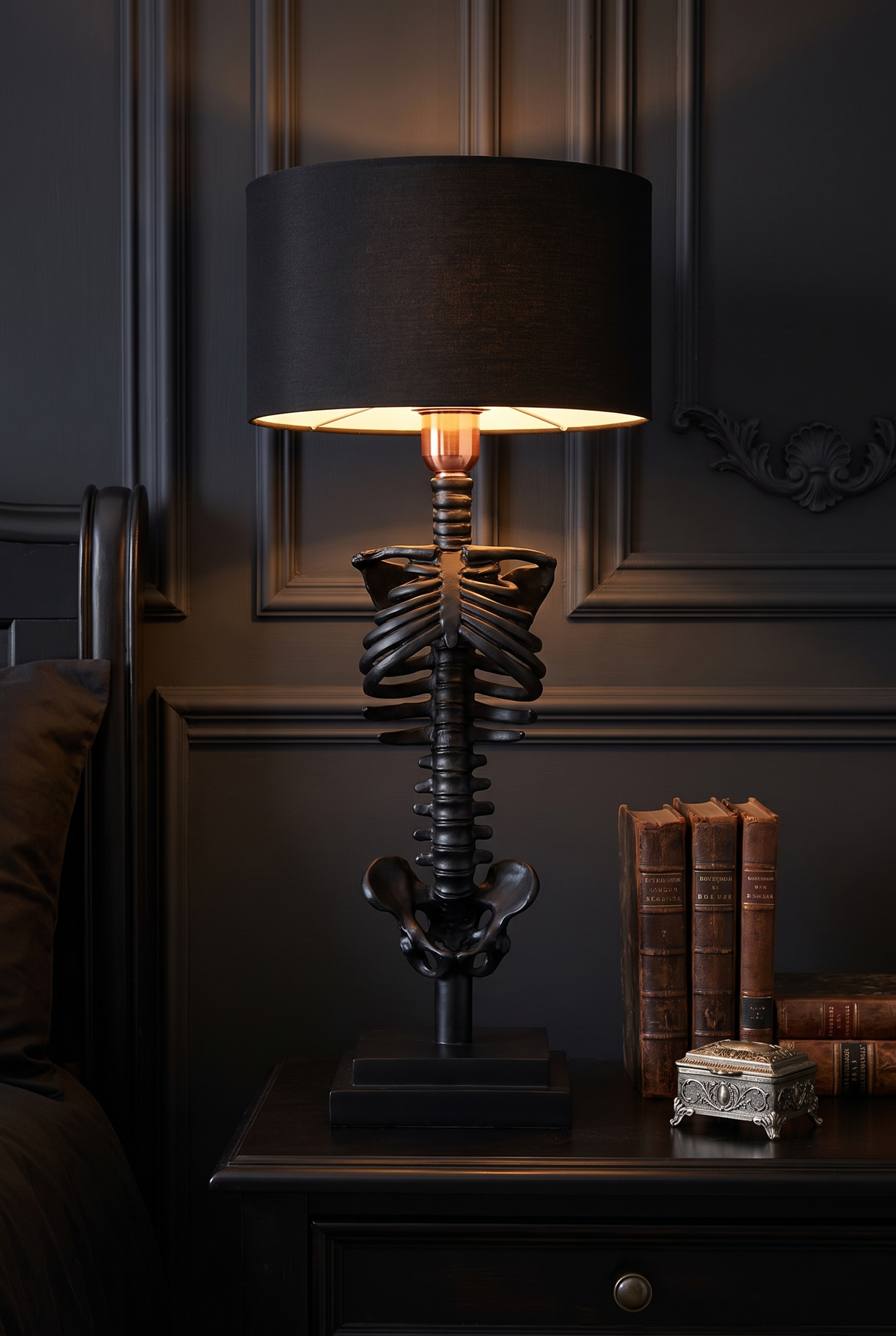 NecroLuxe Gothic Skeleton Table Lamp - in use on bedside console at night